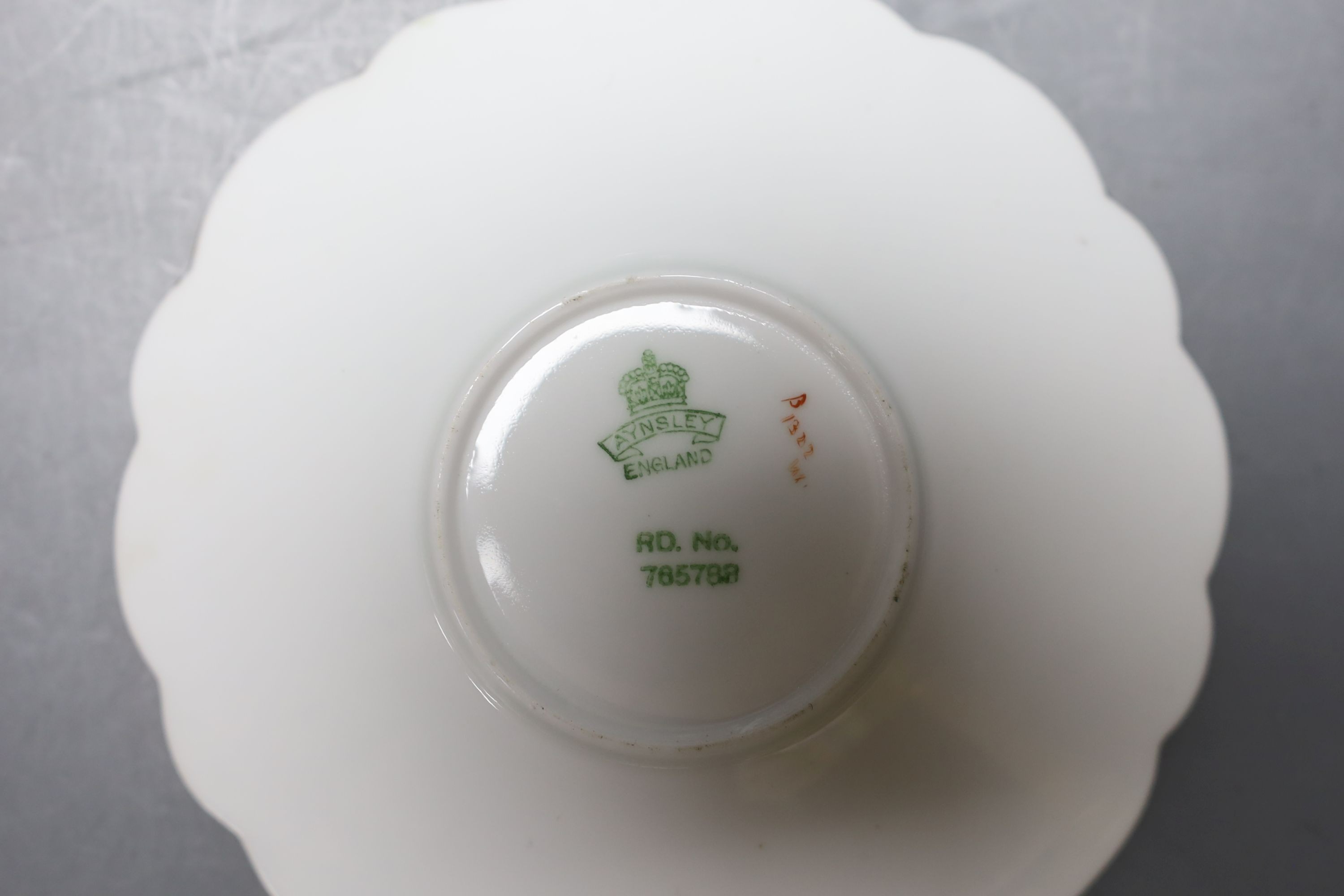 An Aynsley green and white butterfly handled part tea service